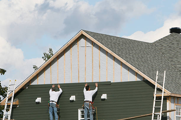 Professional Siding technician working in Spencer, IN